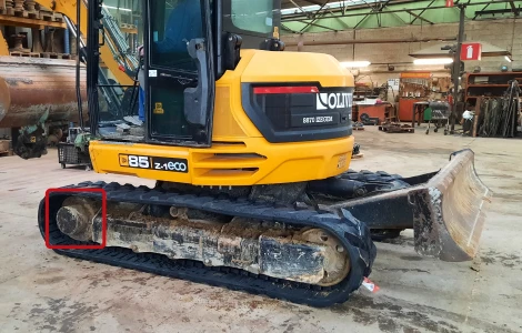Bagger Fahrwerk mit markierten Fahrantrieb